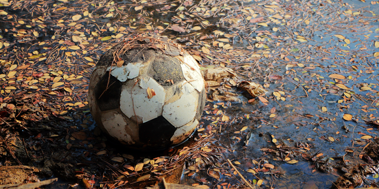 Why are reports of childhood sexual abuse in football rising?